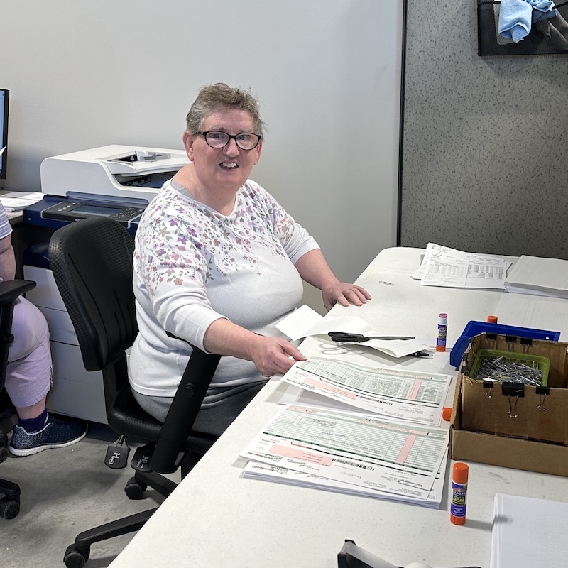 employment services 2 copy Group smiling people with one sitting