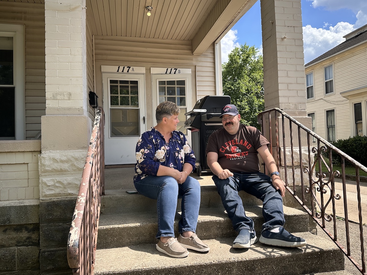 Kristy and Bill sitting on front steps