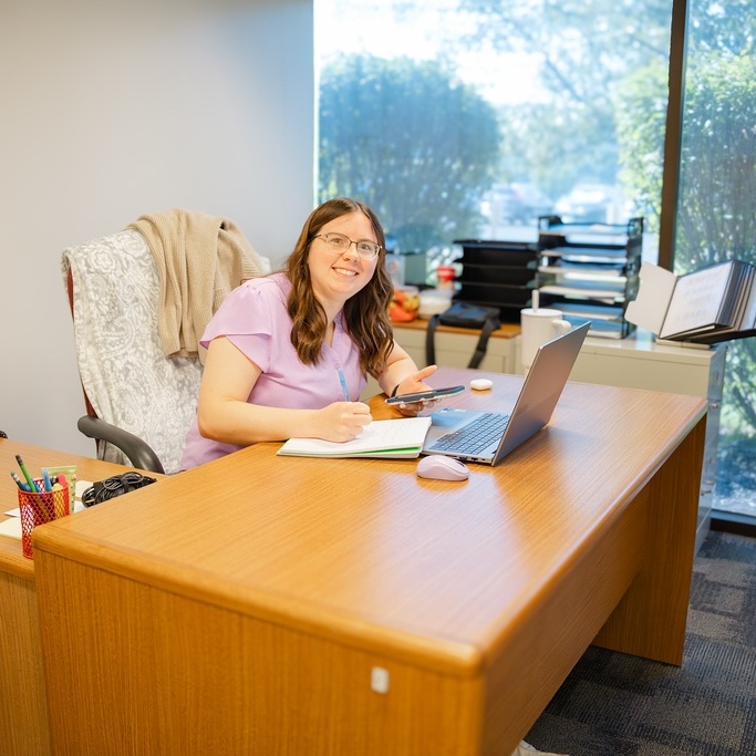 Stephanie at Desk Stephanie at desk with laptop